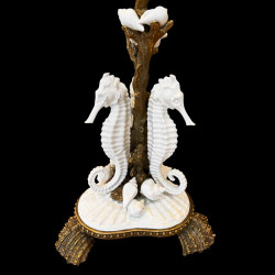 Candle holder with white shells and seahorse